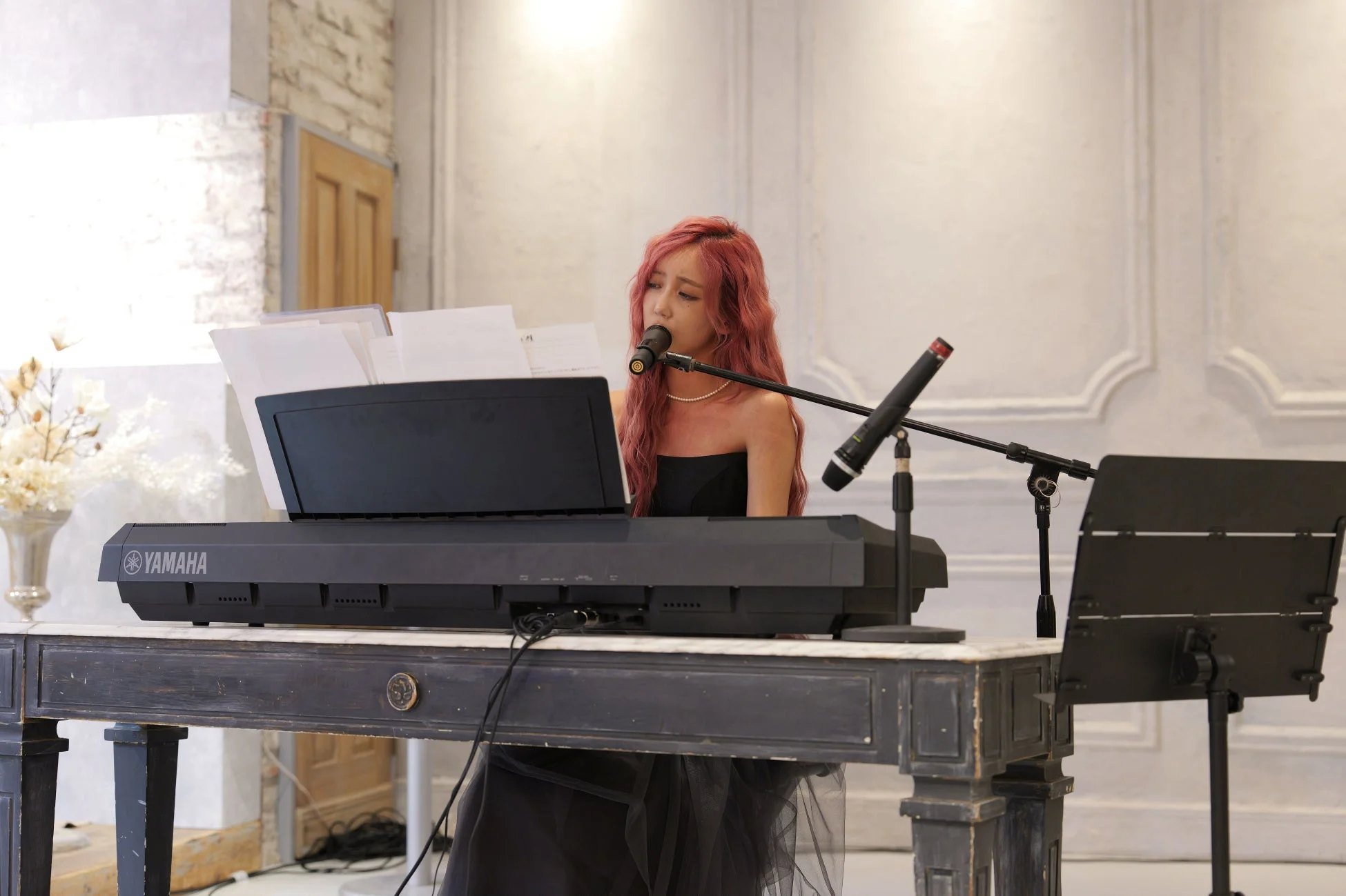 SAYAKA performing on keyboard