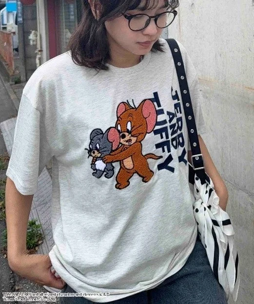 Woman wearing T-shirt with Jerry and Tuffy design
